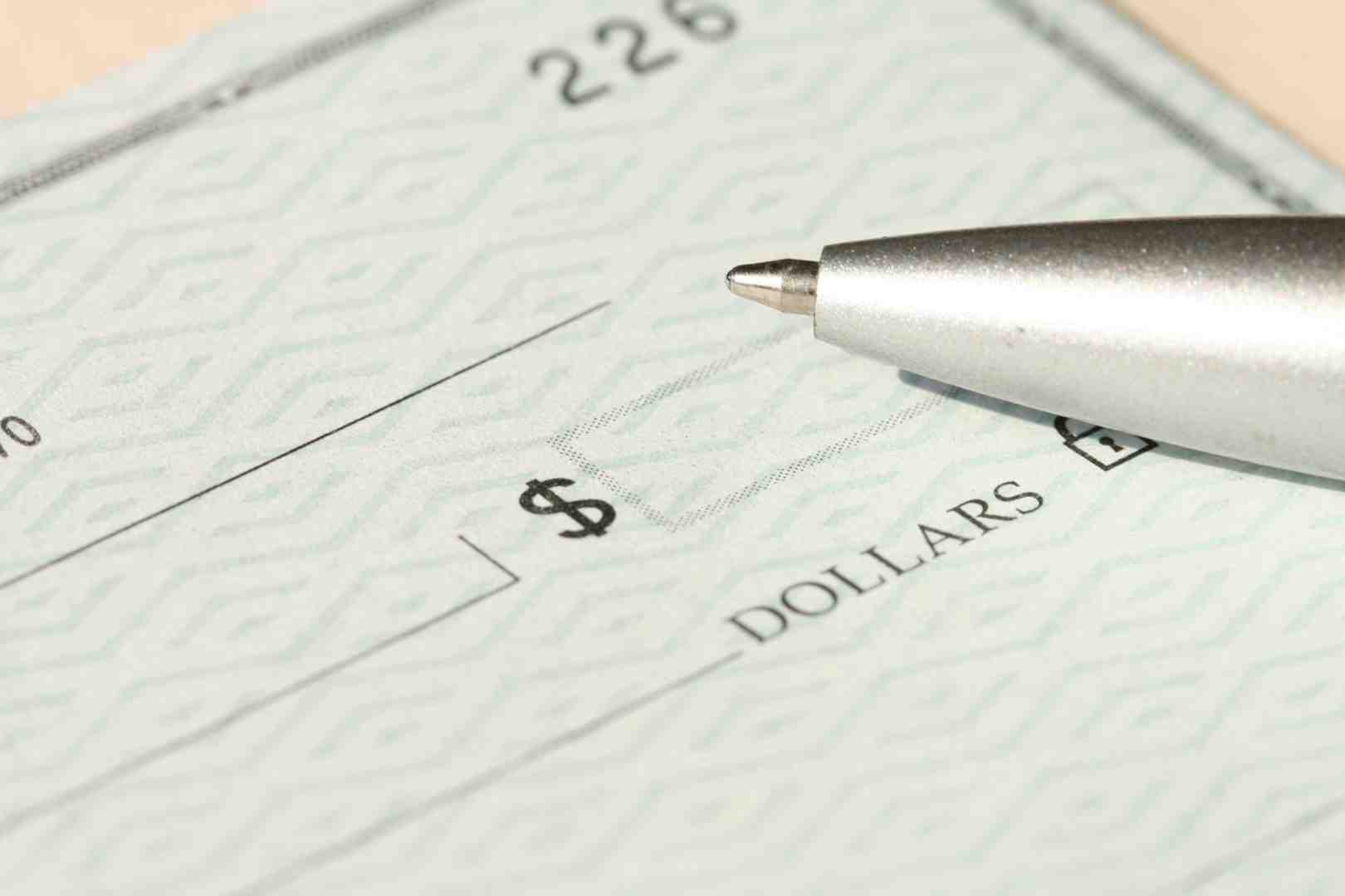 small business owner reviewing financial documents - accountant near me small business