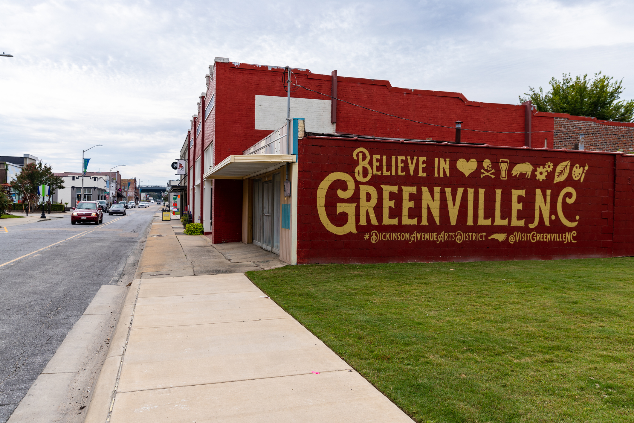 A building with the words "Greenville, NC" on the side of it.
